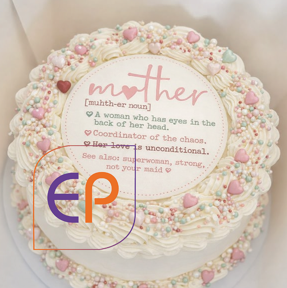 Decorative cake with 'mother' definition text and colorful decorations